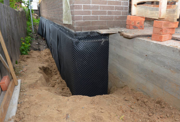 Happy homeowners after waterproofing job in Fort Monmouth